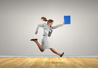 Running businesswoman