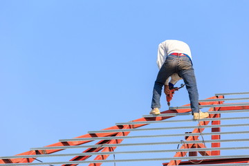 labor working in construction site for roof prepare