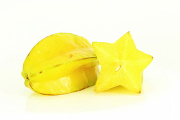 cut and whole star fruit closeup