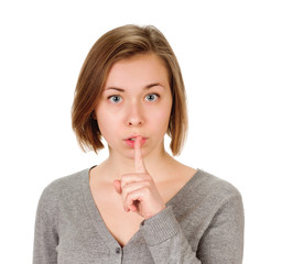 young woman shows sign and symbol on white background