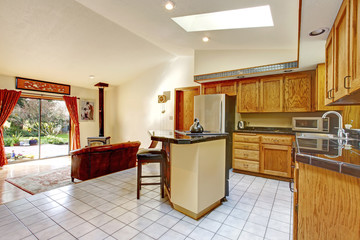 Bright kitchen with dining area and living room