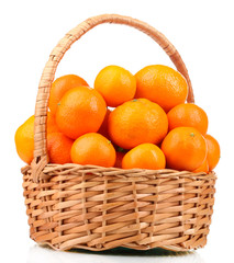 tangerines in a beautiful basket isolated on white
