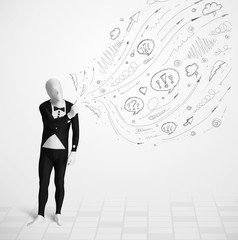 Guy in body suit morphsuit looking at sketches and doodles