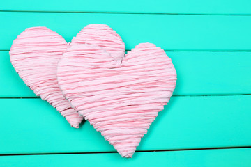 Decorative heart on wooden background