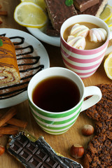 Cup of tea and sweets close up