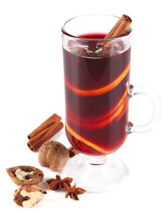 Mulled wine with nuts and spices isolated on white