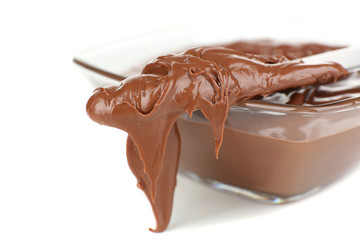 Chocolate cream in bowl isolated on white