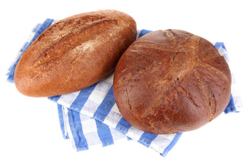 Rye breads on napkin isolated on white