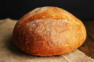 Loaf of bread on dark background