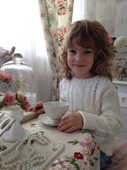 Beautiful girl drinking tea in the cafe