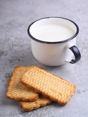 cup of milk with cookies