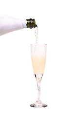Champagne pouring in a glass.
