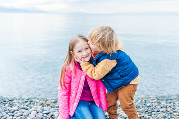 Adorable children playing together outdoors