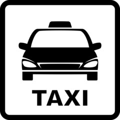 black sign with taxi car