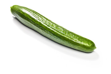 green cucumber on white background