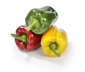 three color peppers on white background