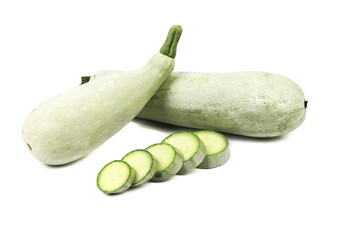 Fresh vegetable marrow and slices.