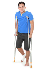 male with broken leg using crutch