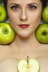 Sensual girl with apples