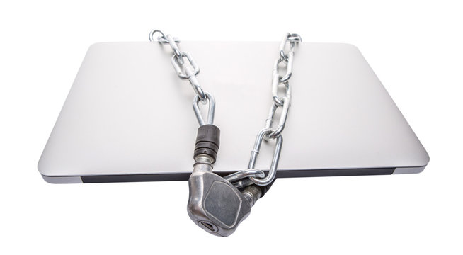 Laptop and chains over white background for PC security