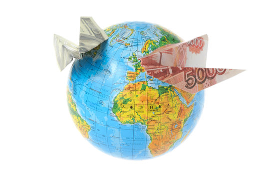 Globe With Origami Planes Made From Money Isolated On White