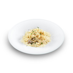 Risotto - rice cooked with broth and sprinkled with grated chees