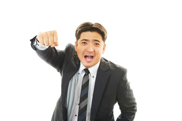 ガッツポーズのビジネスマン