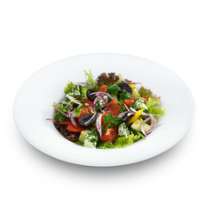 Healthy vegetarian greek salad with tomatoes, feta cheese and ol