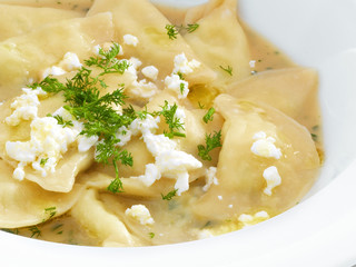 Traditional polish and ukrainian dumplings with healthy vegetari