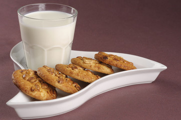 Homemade cookies with nuts and milk