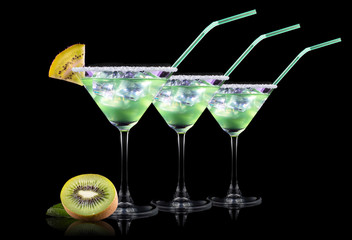 Cocktail Smoothie, with slices of kiwi on a black