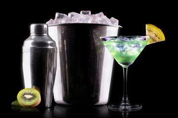 Cocktail Smoothie, with slices of kiwi on a black