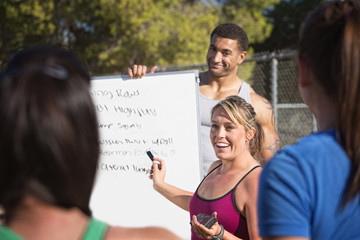 Exercise Teachers Talking to Group