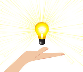 female hand with bright light bulb concept present