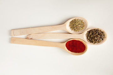 Spice assortment in wooden spoons