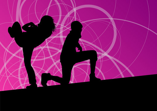 Active young man and woman street break dancers silhouettes in a