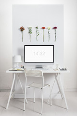 White desk with spring environment.