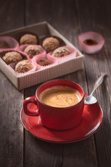 Coffee cup and truffles