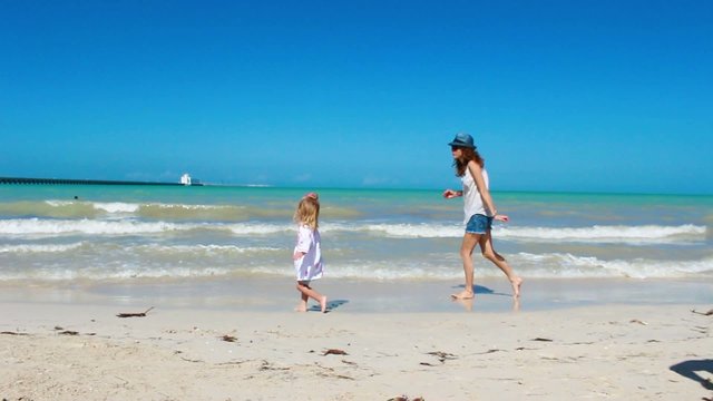 Mom and Daughter on a Yucatan Beach