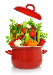 Colorful vegetables in a red cooking pot