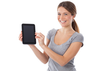 Happy woman presenting a digital tablet