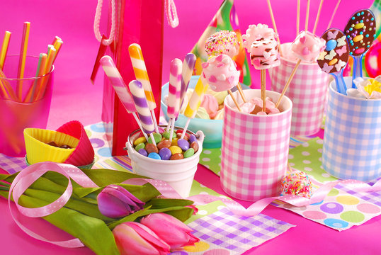 birthday party table with flowers and sweets  for kids