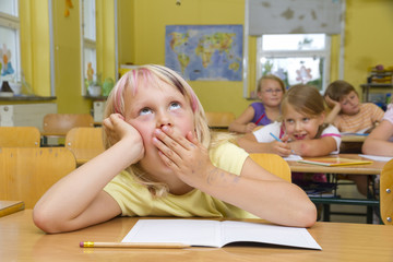 Schoolgirl yawning