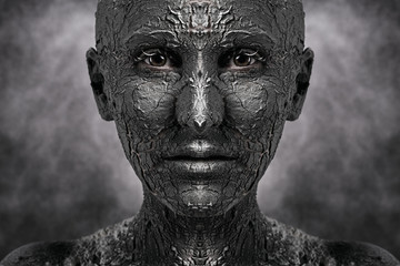 Symmetrical terrible face with cracked skin