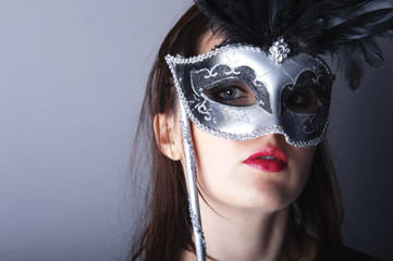 beautiful young girl with venetian mask