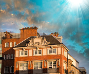 Fototapeta na wymiar Sunset sky in London above old city buildings