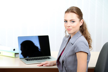 Woman in office at workplace