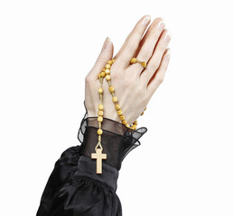 Hands holding black rosary isolated on white background.