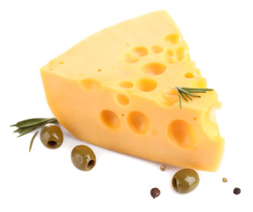 Piece of cheese with green olives, isolated on white