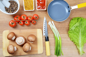 Different products on kitchen table close-up